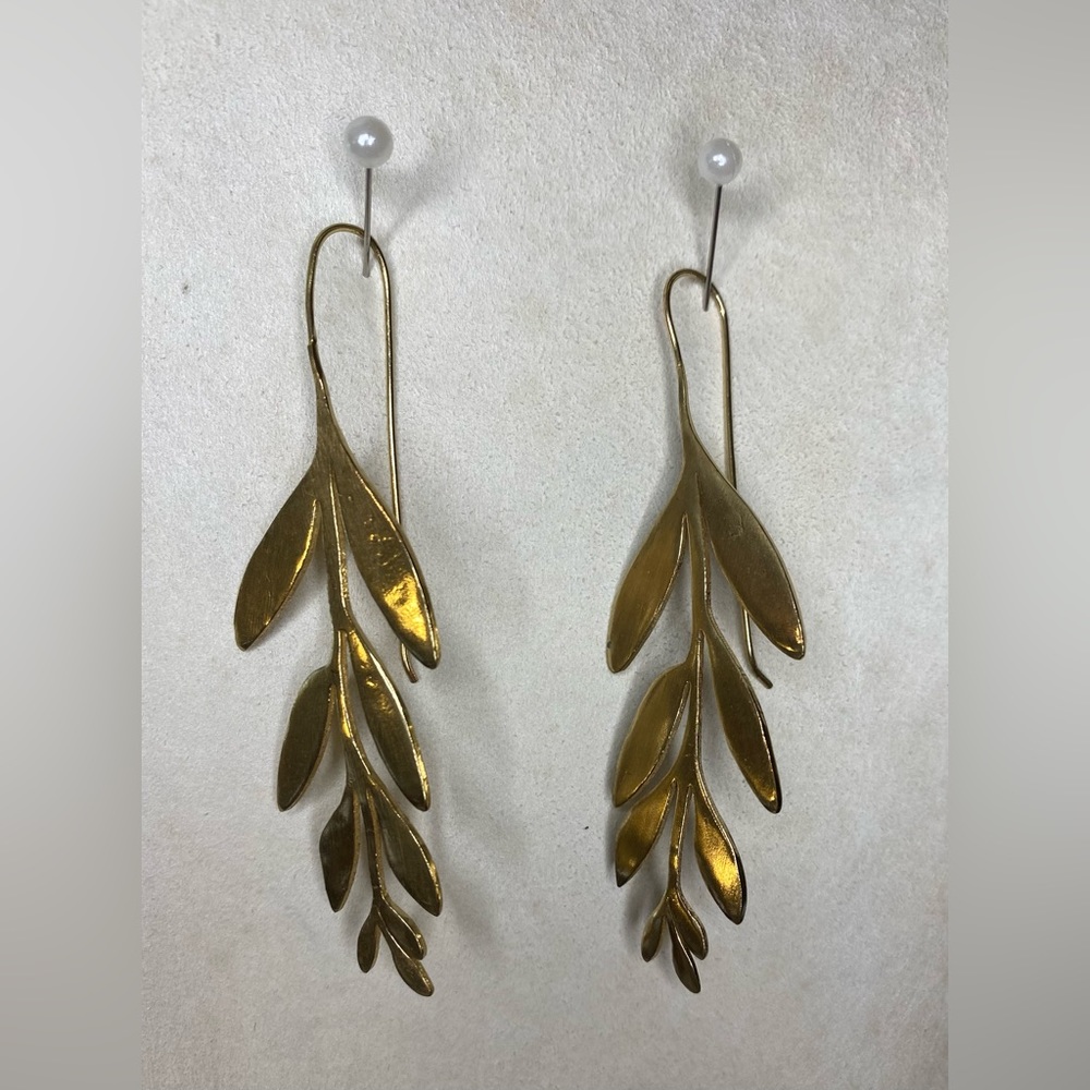 Gold tone leaf earrings 3”